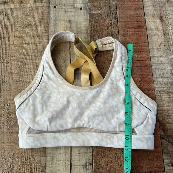 Fabletics Light Beige & White Patterned Sports Bra With Gold Straps - Picture 3 of 6